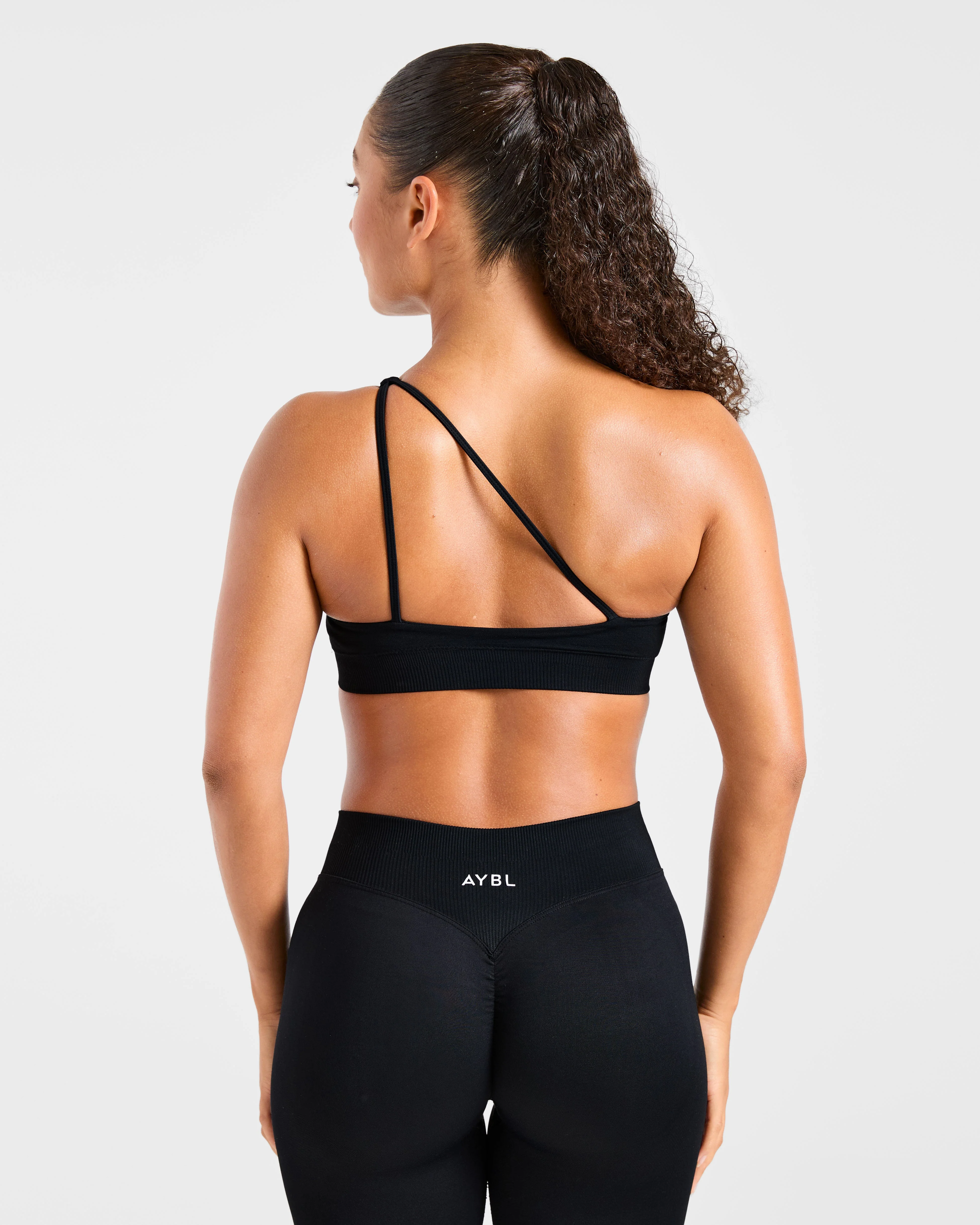 Enhance Seamless One Shoulder Sports Bra - Black - Image 2
